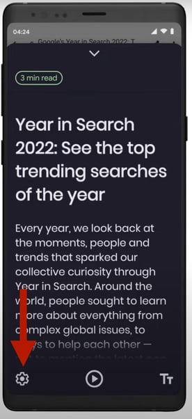 an image of a website in Reading Mode with an arrow pointing to the Settings Icon